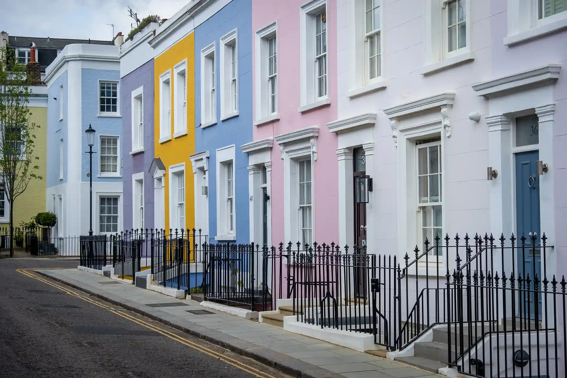 Row of bright houses - freehold insurance